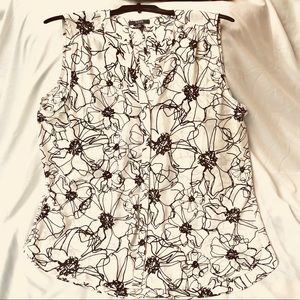 Never worn, but tags removed, sleeveless floral